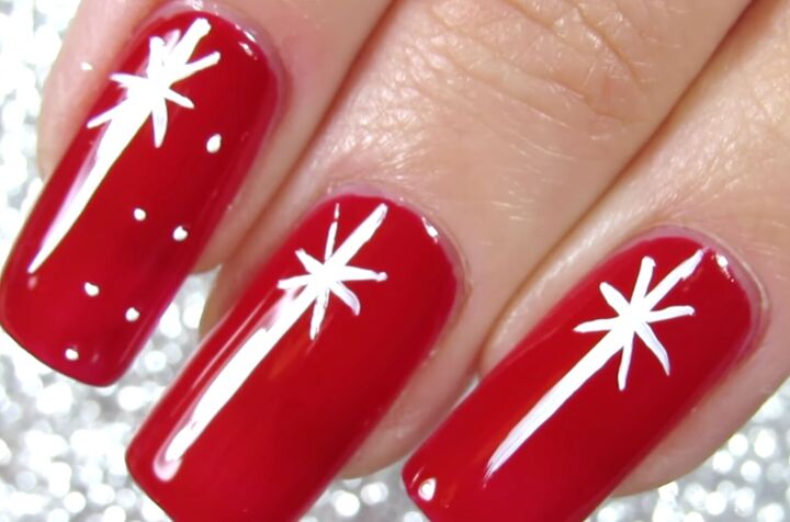 how to do pretty red christmas nails with easy star snow designs, Applying small white dots on the nails