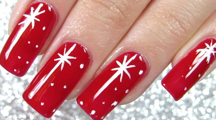 how to do pretty red christmas nails with easy star snow designs, Pretty red Christmas nails with stars snow
