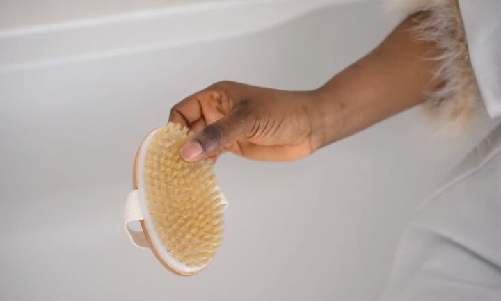 learn how to rest unwind with this relaxing self care bath routine, Using a dry brush on the body