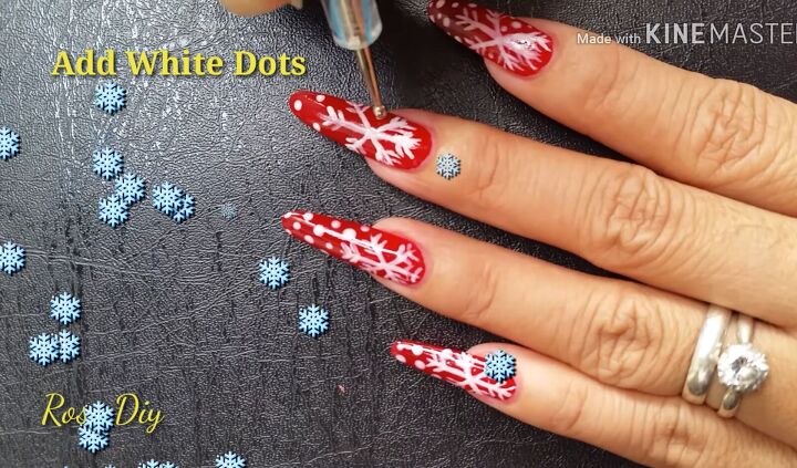 ready for christmas here s how to do cute red nails with snowflakes, Adding white snow with a dotting tool