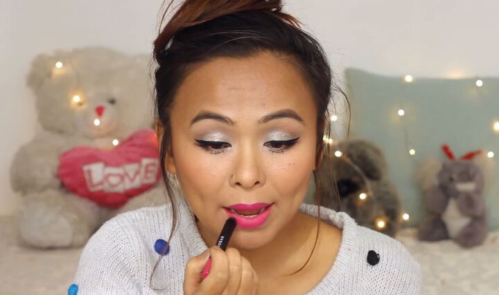 pink silver makeup tutorial a cute sparkly look for the holidays, Applying pink lipstick