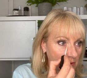 how to cover dark circles under eyes on mature skin step by step, Applying orange color corrector under eyes