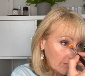 how to cover dark circles under eyes on mature skin step by step, Applying concealer to the inner corners