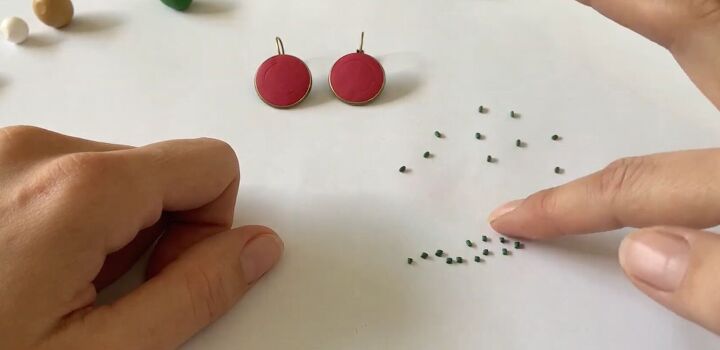 these intricate diy poinsettia earrings are made from polymer clay, Cutting green clay into very small pieces