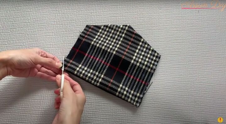 how to make a simple diy envelope purse great gift idea, Snipping the corners of the purse