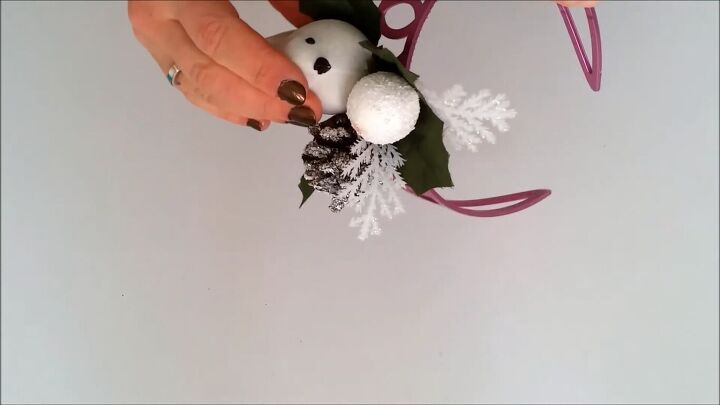 how to make cute ornament christmas tree headbands for the holidays, Gluing the Christmas ornament to the headband