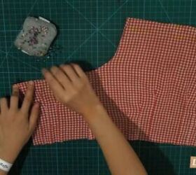 how to repurpose a button down shirt to make a diy tie back crop top, Hemming the raw edges of the crop top
