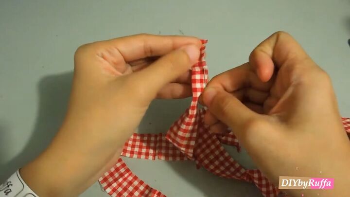 how to repurpose a button down shirt to make a diy tie back crop top, Pinning the ties ready to sew