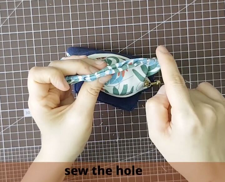 how to make a cute diy card coin purse easy quick sew gift idea, Hand sewing the opening closed