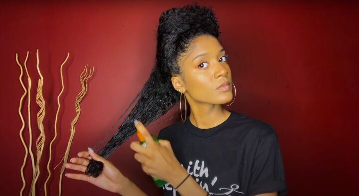 how to do a perfect hollywood style bantu knot out on blow dried hair, Spraying heat protectant on hair