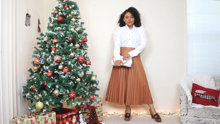 4 cute christmas outfits with leather skirts to wear for the holidays, Tan pleated leather skirt with a white shirt