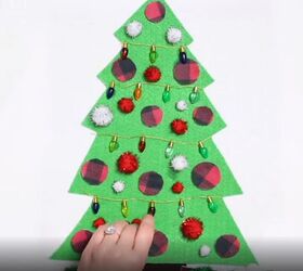 6 amazing diy ugly christmas sweater ideas including 1 for hanukkah, Decorating the Christmas tree on the DIY sweater