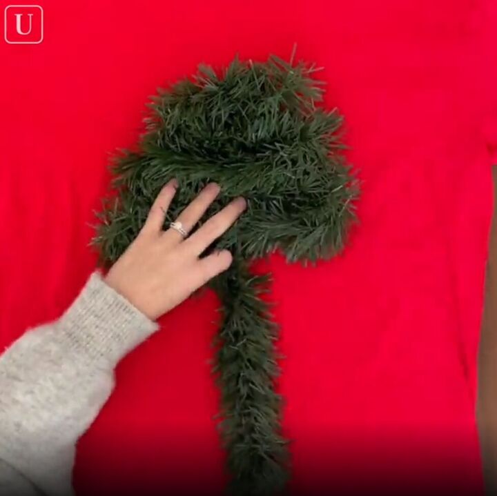 6 amazing diy ugly christmas sweater ideas including 1 for hanukkah, Making a Christmas tree shape out of green tinsel