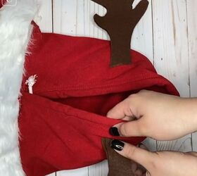 6 amazing diy ugly christmas sweater ideas including 1 for hanukkah, Gluing the antlers to the hood of the sweatshirt