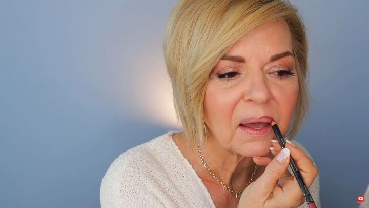 how to fake big lips over 50 lipstick tutorial for mature women, Applying lip liner