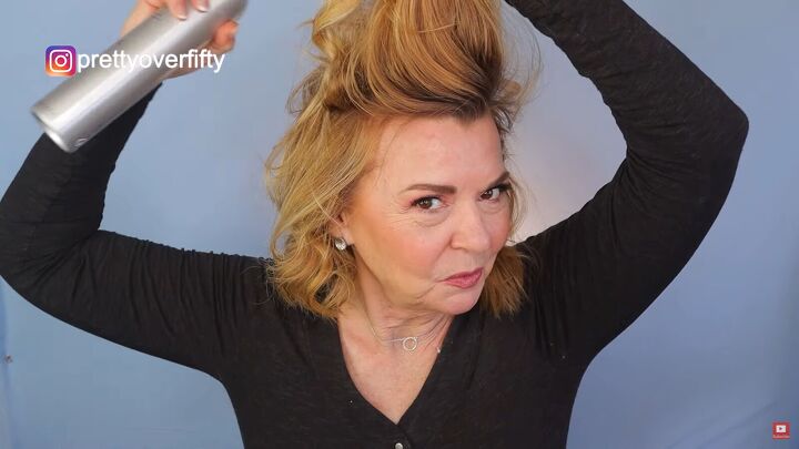 how to do a cute curly short hairstyle for women over 50, Spraying hairspray at the roots