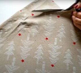 make your own christmas dress from an old top a festive tablecloth, Cutting a waist hole for the tablecloth skirt