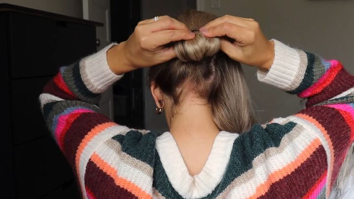 5 easy holiday hairstyles ponytails braided updos chignons more, Creating a low chignon at the back