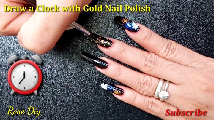 how to do black gold new years nails with fun firework designs, Drawing a gold clock for the New Year s nails