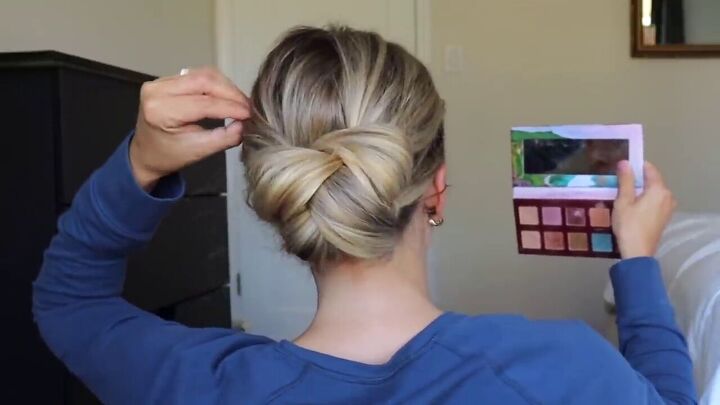 try this easy updo hair hack for a sophisticated elegant hairstyle, Pinching hair for added texture and volume
