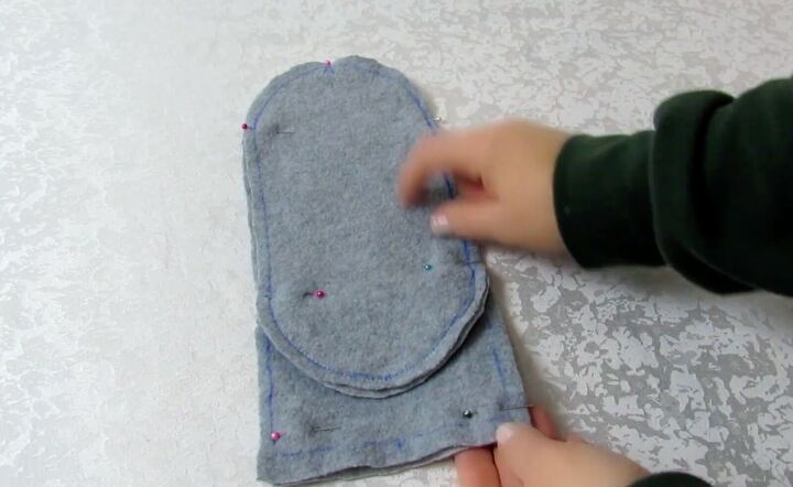 how to make fleece slipper socks to keep your toes cozy this winter, Pinning the side seams of the fleece socks