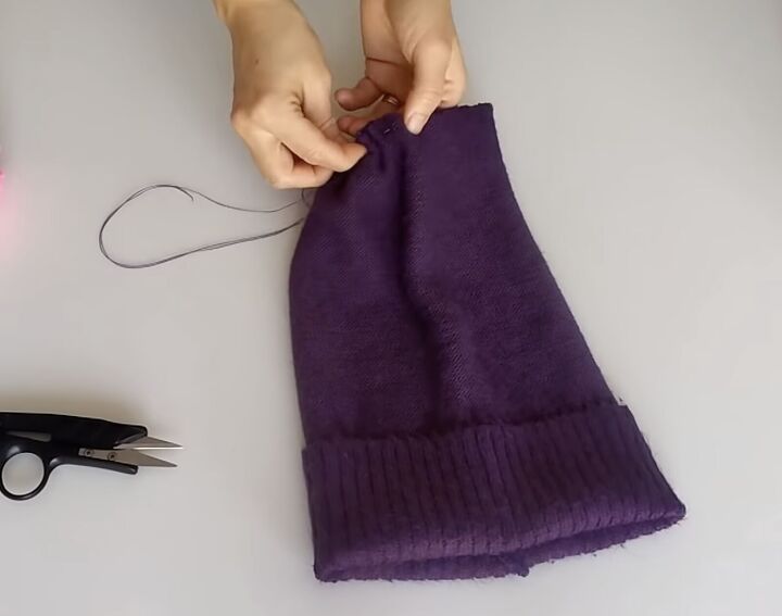 how to sew a beanie 2 ways using fleece fabric or an old sweater, Hand sewing a gathering stitch to pull