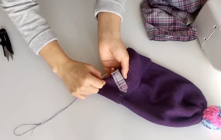 how to sew a beanie 2 ways using fleece fabric or an old sweater, Adding a sleeve tab to cover the fold