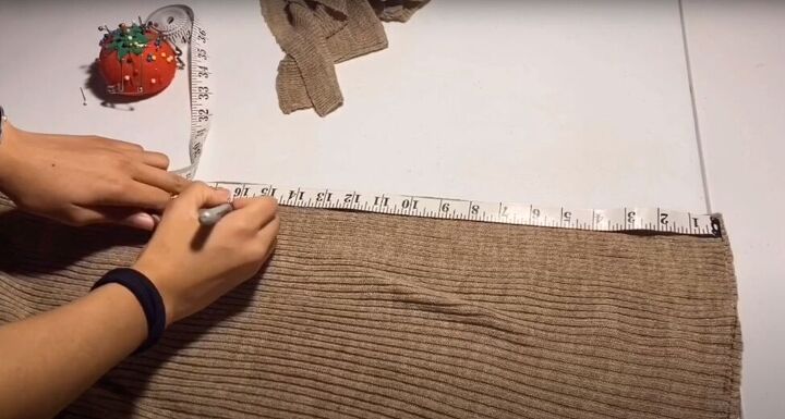 how to make a cute diy scarf with sleeves in 4 quick steps, Measuring the sleeves for the scarf