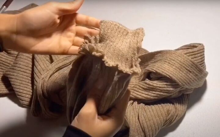 how to make a cute diy scarf with sleeves in 4 quick steps, Finished cuff of the scarf with sleeves
