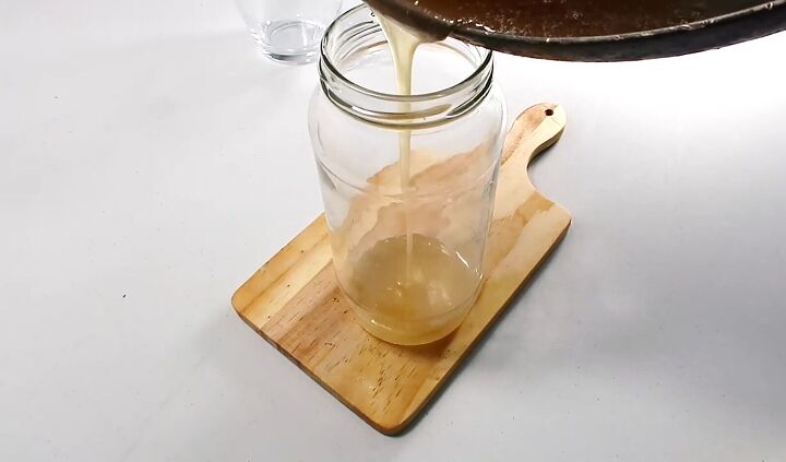 this easy diy sugar wax recipe needs only 3 ingredients, Pouring the hot DIY sugar wax into a jar