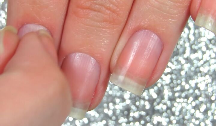 how to wear dark nail polish step by step nail polish painting tips, Pushing back cuticles with a fingernail