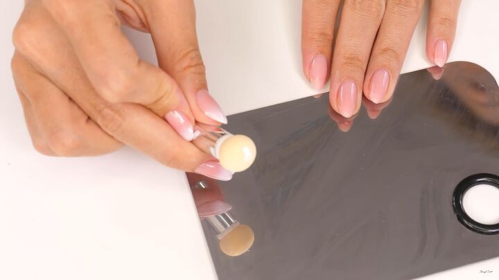 how to do elegant classy baby boomer nails at home, Dabbing the sponge in the white gel