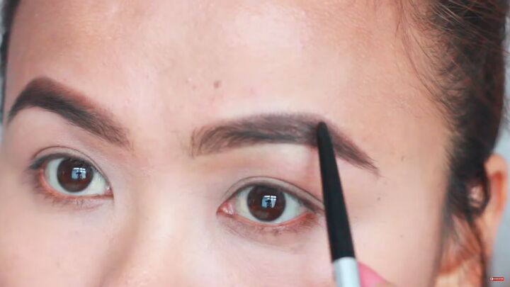 looking for painless brow grooming here s how to shave your eyebrows, Filling in brows with an eyebrow pencil