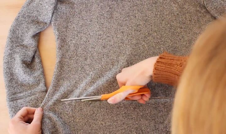 how to make a diy cropped sweater fix an unflattering fit, Cutting the front of the sweater