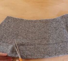 how to make a diy cropped sweater fix an unflattering fit, Cutting open the loop at the seam