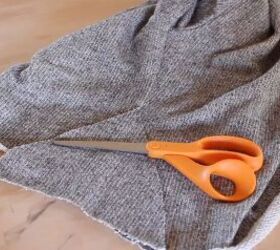 how to make a diy cropped sweater fix an unflattering fit, Cutting slits for the extra fabric