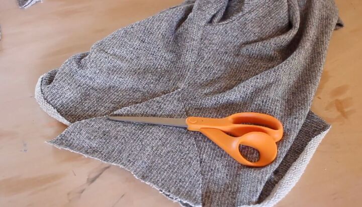 how to make a diy cropped sweater fix an unflattering fit, Cutting slits for the extra fabric