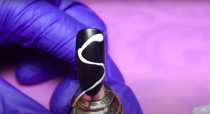 how to do funky neon smoke nail art using 3 different methods, Applying white polish to the black nail