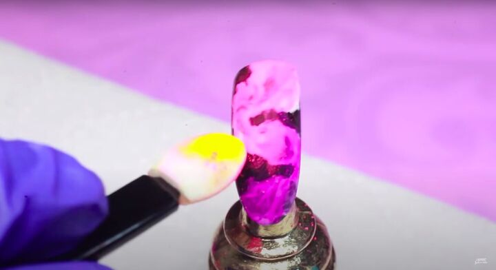 how to do funky neon smoke nail art using 3 different methods, Applying neon pigments to the nail
