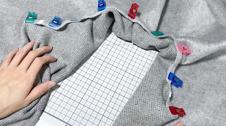 how to sew a circle coat a cozy short coat perfect for winter, Folding the neckline in