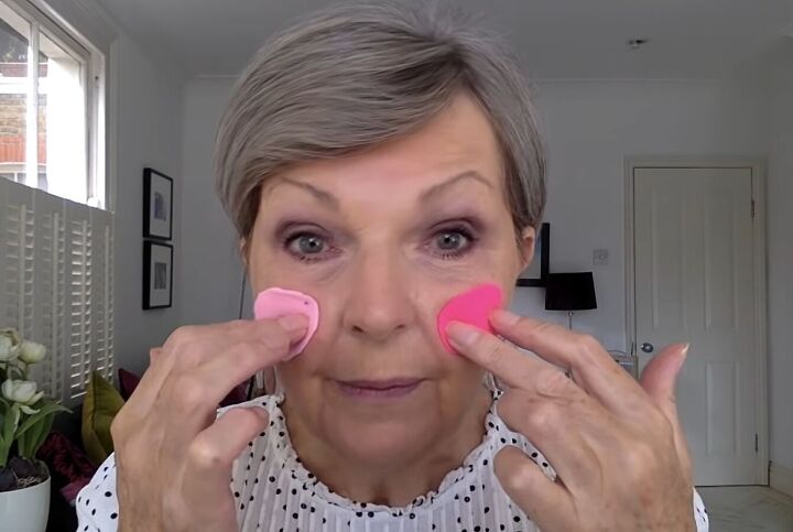 the ultimate guide to blush for older women placement color more, Applying blush to the apples of cheeks