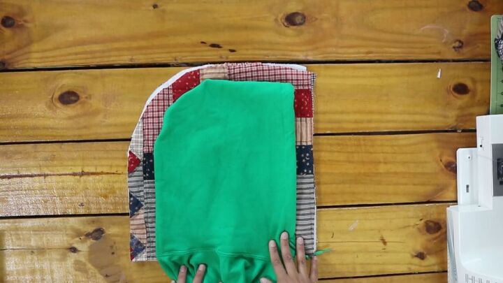 how to make a cozy reversible quilted jacket out of old blankets, Using a hood template to create the curve