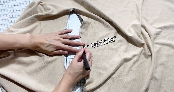 need a cool layering piece this winter try this diy hooded vest, Marking the center in the hole
