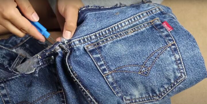 how to take in jeans the proper way for a perfect fit, Opening the back center seam of the jeans