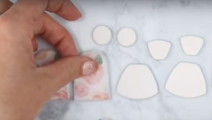how to make polymer clay earrings with cute designs from napkins, Placing the napkin pieces on the polymer clay