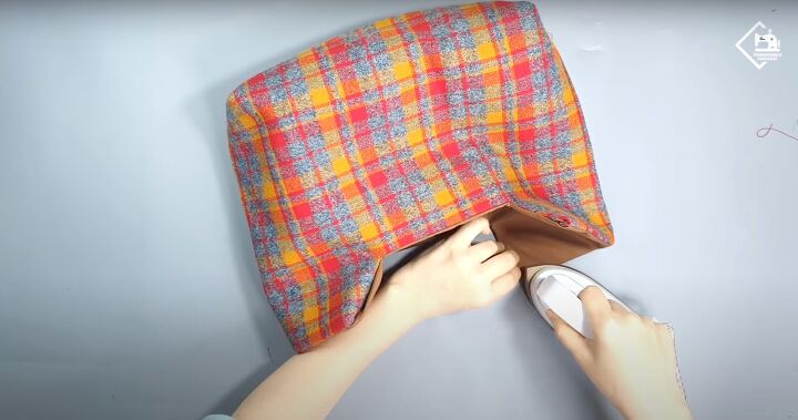 how to sew a cute plaid purse perfect for fall and winter, Ironing the lining