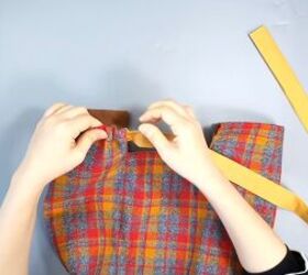 how to sew a cute plaid purse perfect for fall and winter, Inserting the straps into the casing