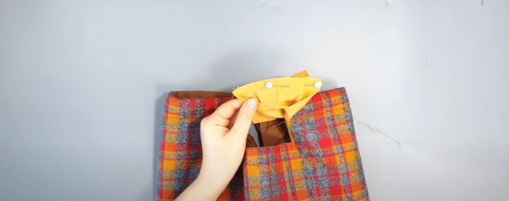 how to sew a cute plaid purse perfect for fall and winter, Attaching the straps to the purse