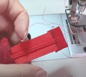 how to sew a romantic vintage inspired puff sleeve dress, Finishing the raw end of the zipper tape