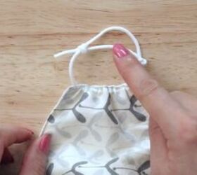 how to sew an easy face mask with adjustable straps free pattern, Making an adjustable knot for the ear loops